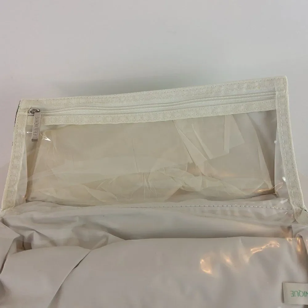 Clinique cream floral print fold over makeup / jewelry bag.